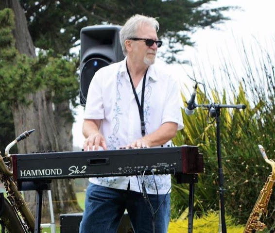 Terry Lawless performing on the keyboard