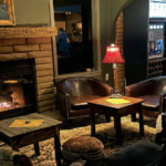 The Optimyst tasting room with fireplace